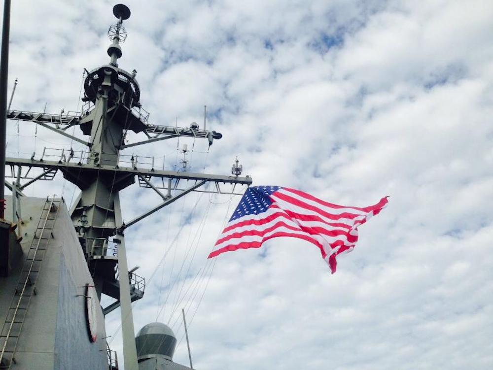 USS Pinckney proudly displaying the United States Flag on deployment in 2017. Photo credit to ET1 Megan Stilley.